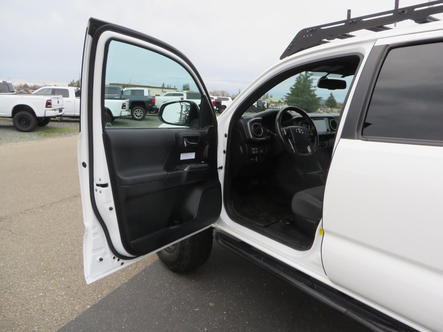 2016 White /GREY Toyota Tacoma TRD OFF-ROAD Double Cab Long Bed V6 6AT 4WD (3TMCZ5AN3GM) with an 3.5L engine, automatic transmission, located at 2630 Grass Valley Highway, Auburn, CA, 95603, (530) 508-5100, 38.937893, -121.095482 - Looking for the ultimate overlanding vehicle. Look no further than this purpose built Tacoma set up for all of your adventures. - Photo#27